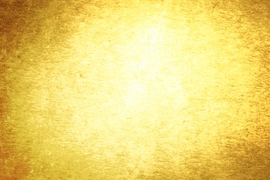 Image of Golden textured surface as background, closeup view