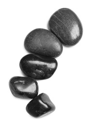 Photo of Group of different stones on white background, top view