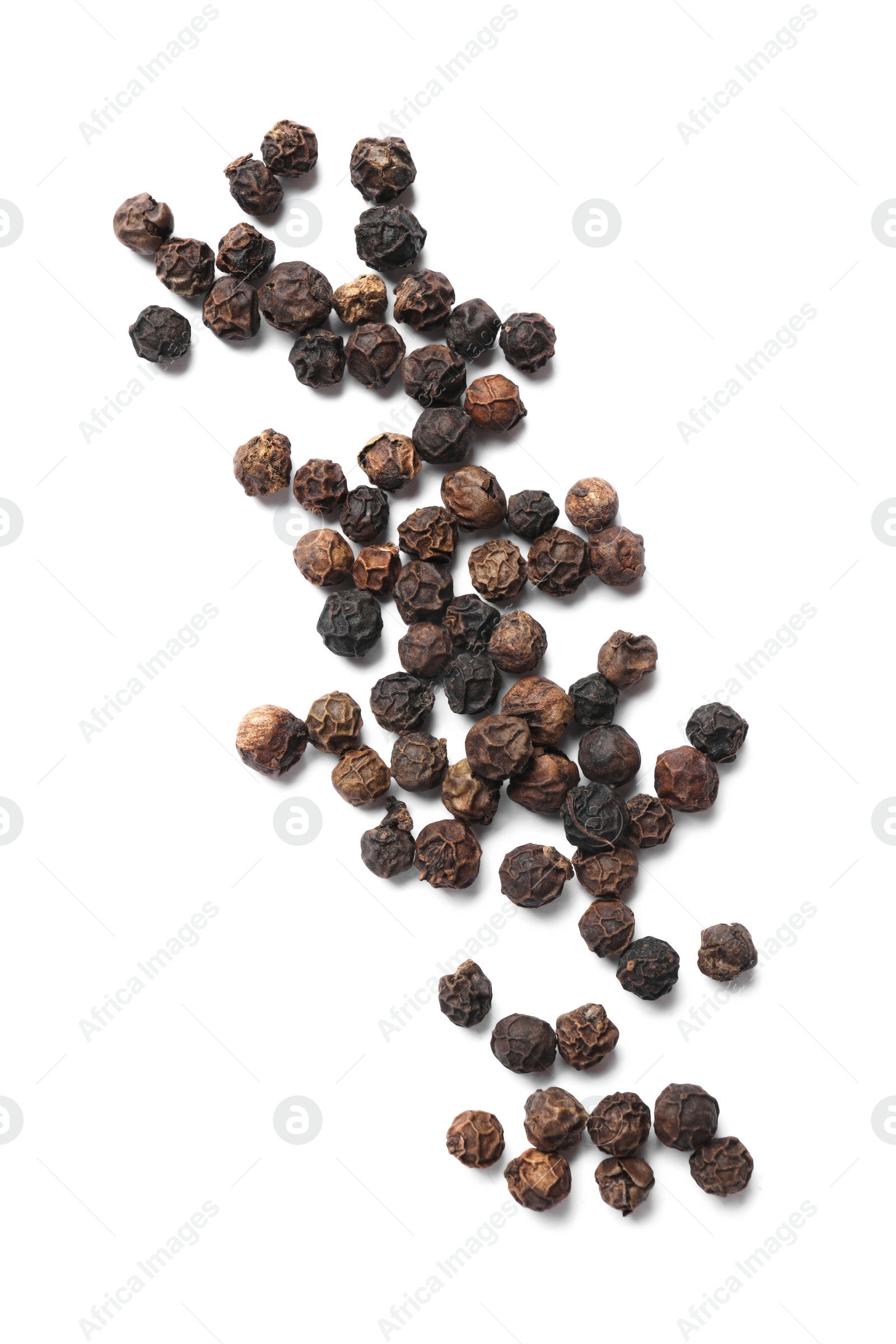 Photo of Aromatic spice. Many black dry peppercorns isolated on white, top view