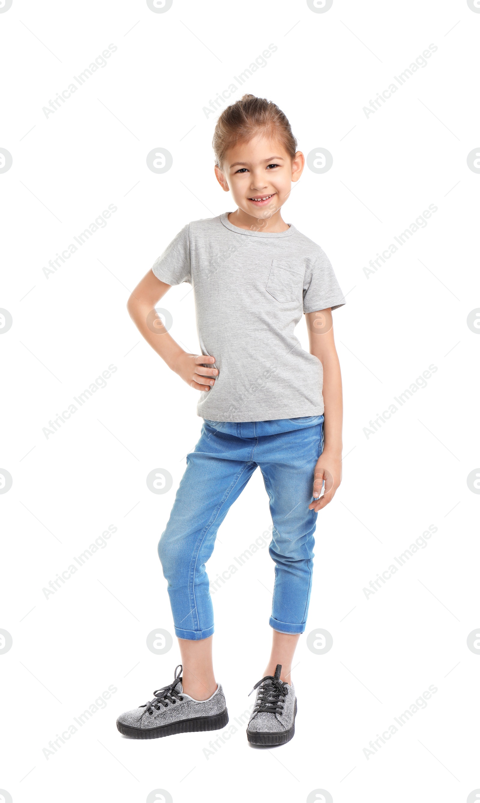 Photo of Little girl in t-shirt on white background. Mockup for design