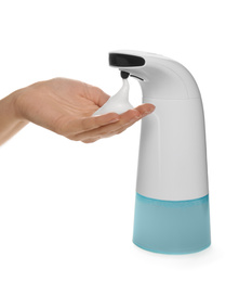 Photo of Woman using automatic soap dispenser on white background, closeup