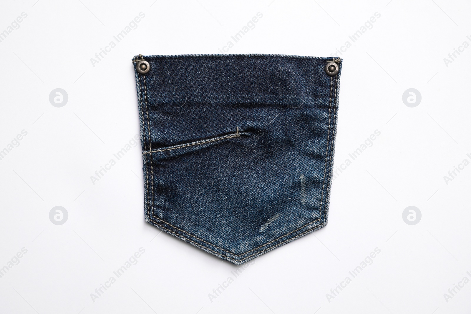 Photo of Jeans pocket isolated on white, top view