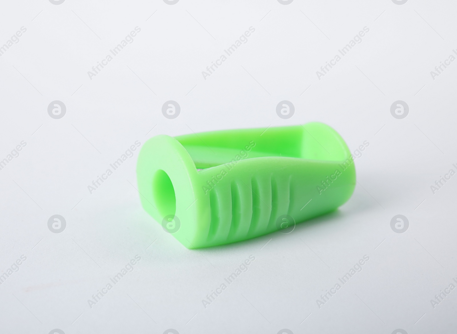 Photo of Modern green pencil sharpener on white background