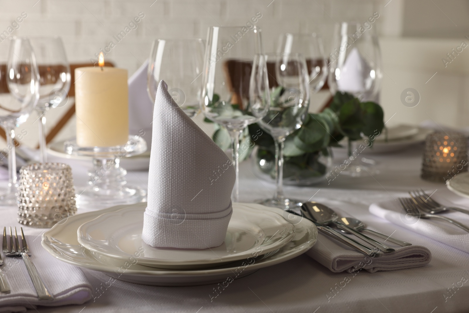 Photo of Stylish elegant table setting in restaurant. Space for text