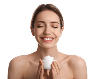 Photo of Young woman holding jar of facial cream on white background