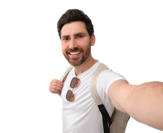 Smiling man taking selfie on white background