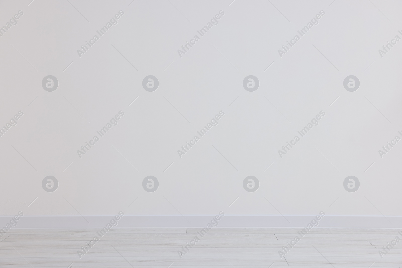 Photo of Beautiful white wall in clean empty room