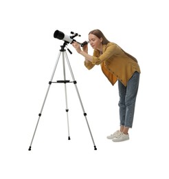 Photo of Young astronomer looking at stars through telescope on white background