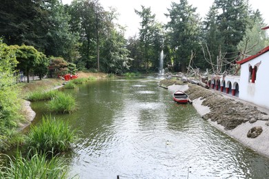 Photo of Amersfoort, the Netherlands - August 20, 2022: Beautiful view of canal in DierenPark