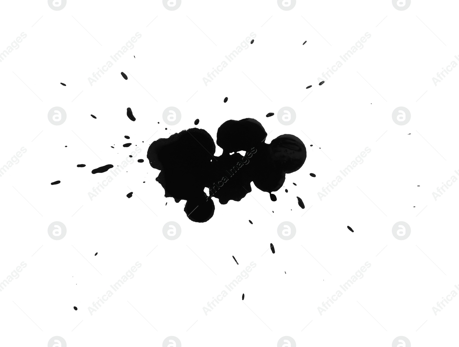 Photo of Blots of black ink isolated on white, top view