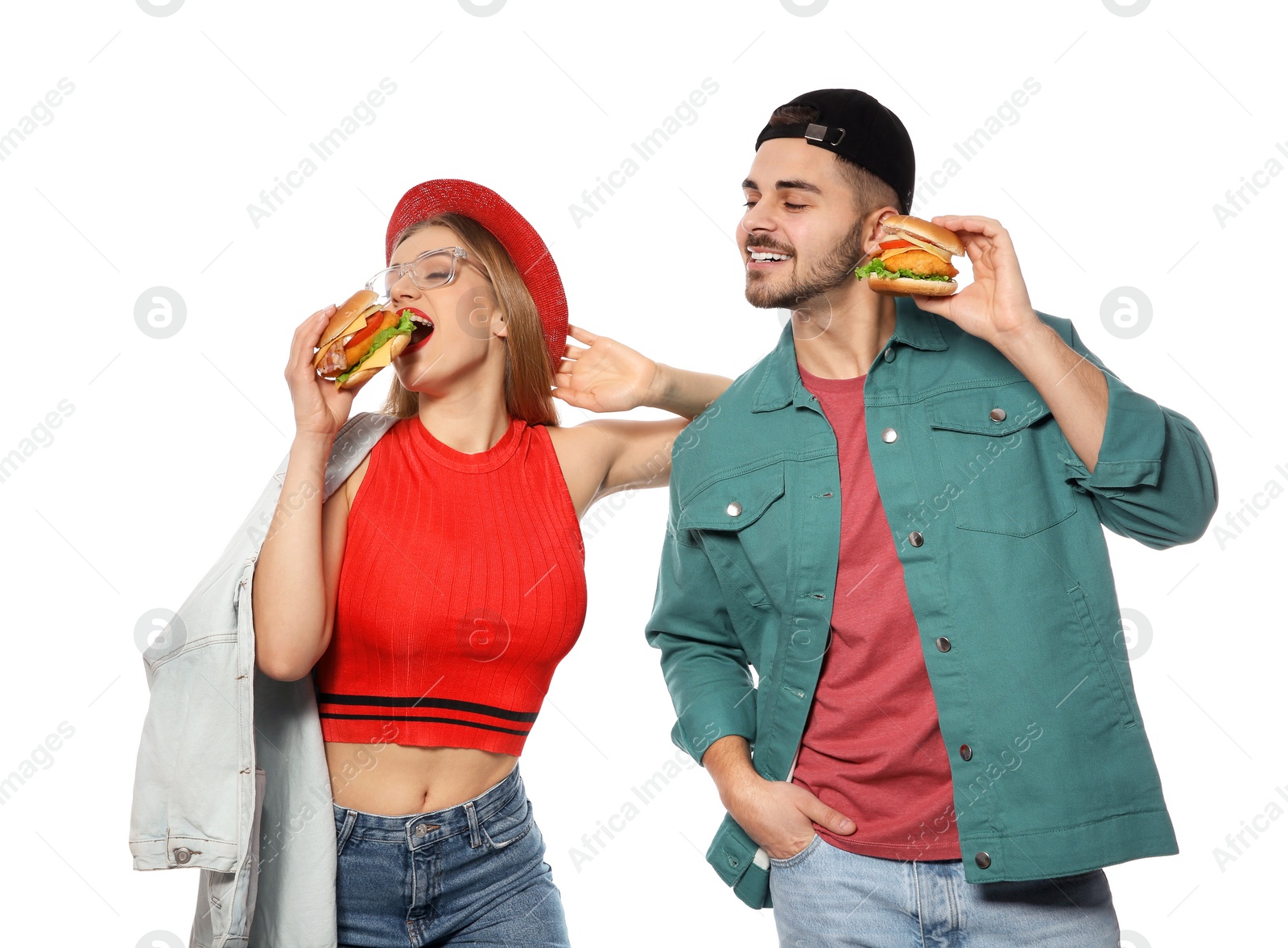 Photo of Happy couple with tasty burgers isolated on white
