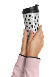 Photo of Woman holding elegant thermocup on white background, closeup