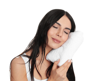 Photo of Young woman wiping face with towel on white background