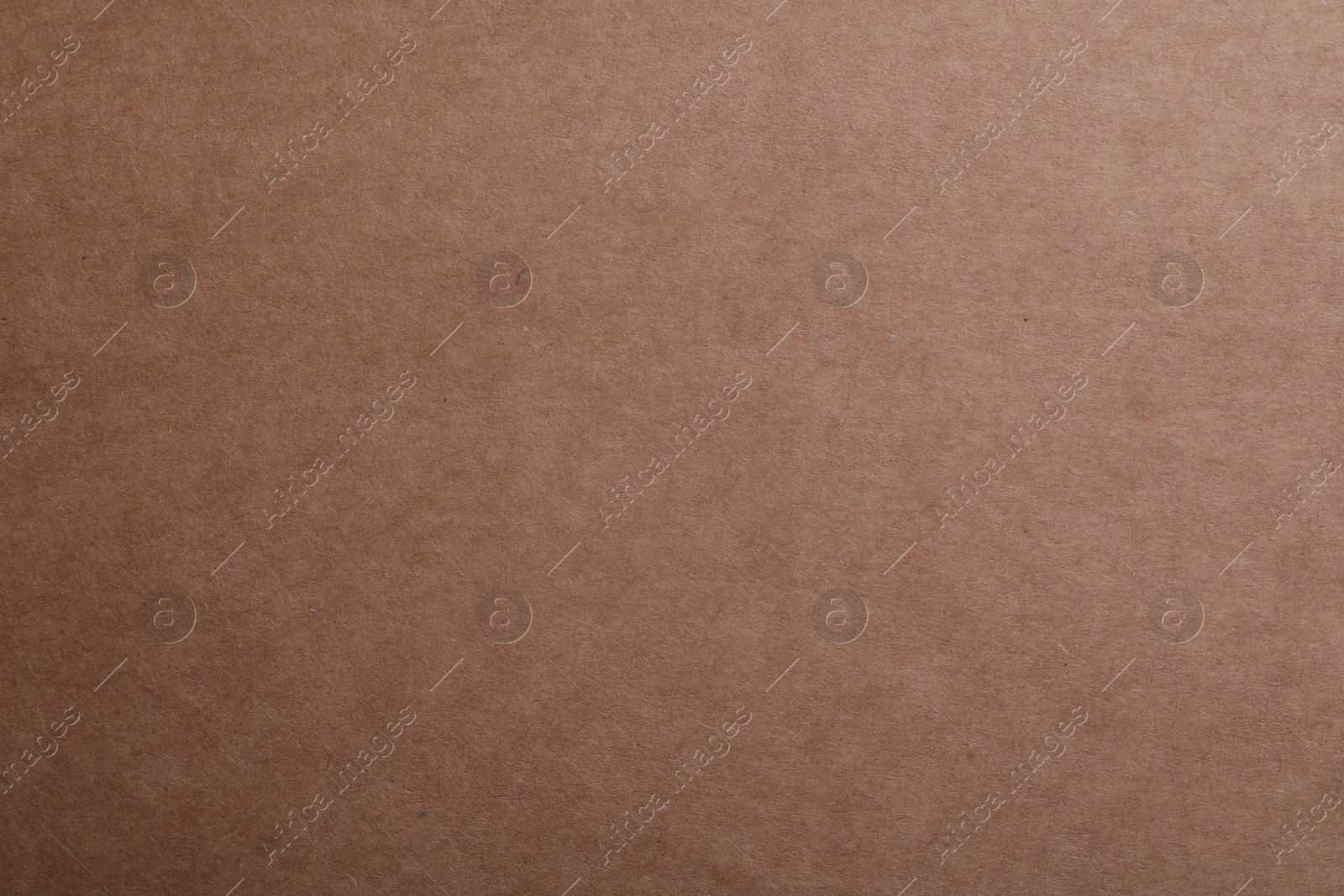 Photo of Texture of kraft paper bag as background, closeup