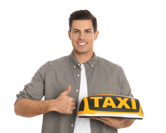 Photo of Man holding taxi sign on white background