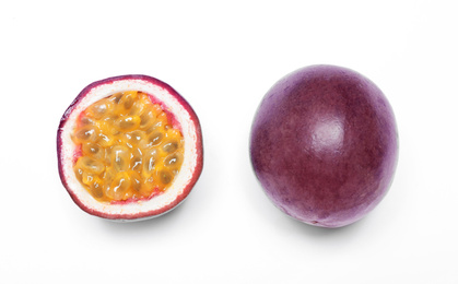 Fresh ripe passion fruits (maracuyas) on white background, flat lay