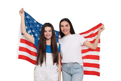 4th of July - Independence day of America. Happy mother and daughter with national flag of United States on white background