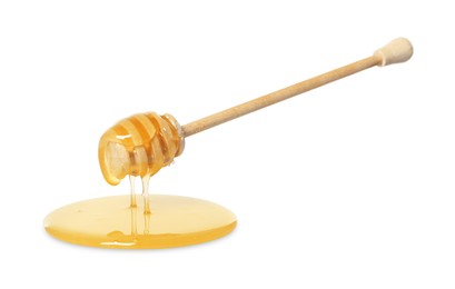 Natural honey dripping from dipper on white background