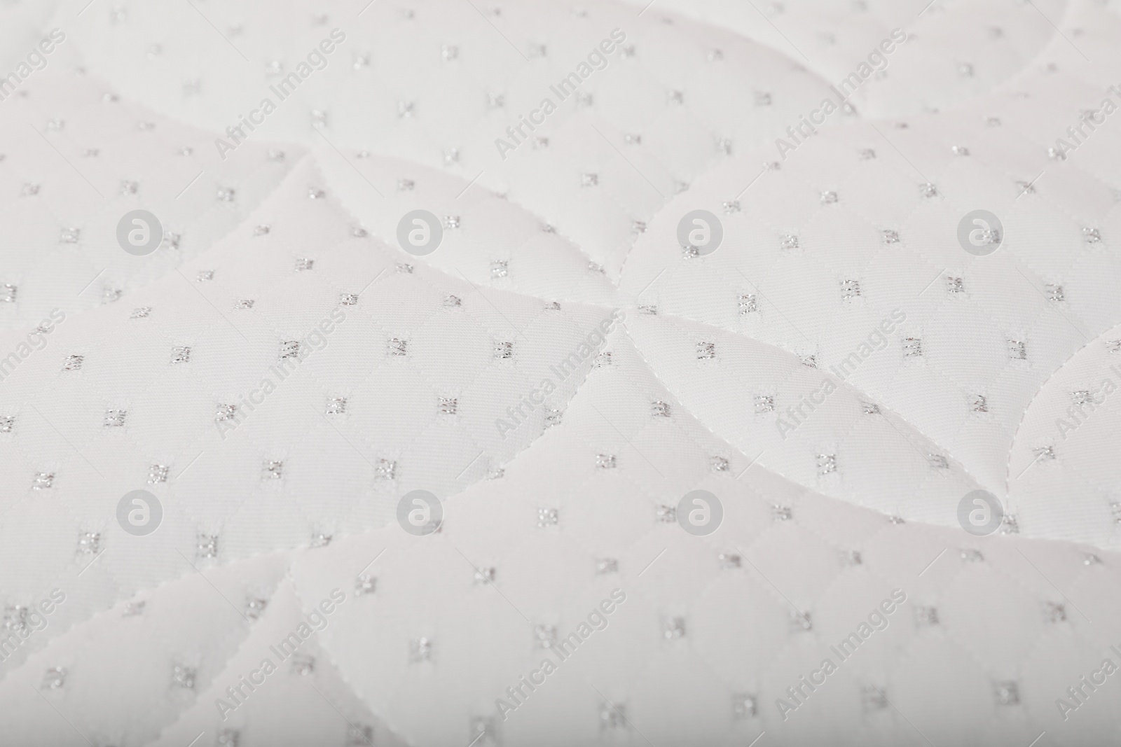 Image of Modern comfortable orthopedic mattress as background, closeup