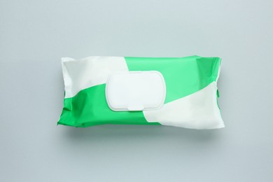 Image of Wet wipes flow pack on light background, top view