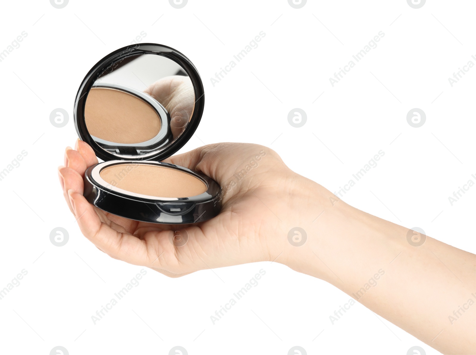 Photo of Woman holding black pocket powder with mirror on white background, closeup. Cosmetic product