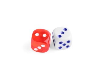 Photo of Two color game dices isolated on white