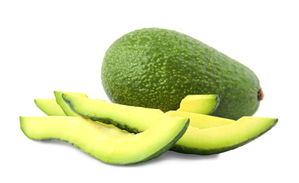 Photo of Tasty ripe avocados on white background. Tropical fruit