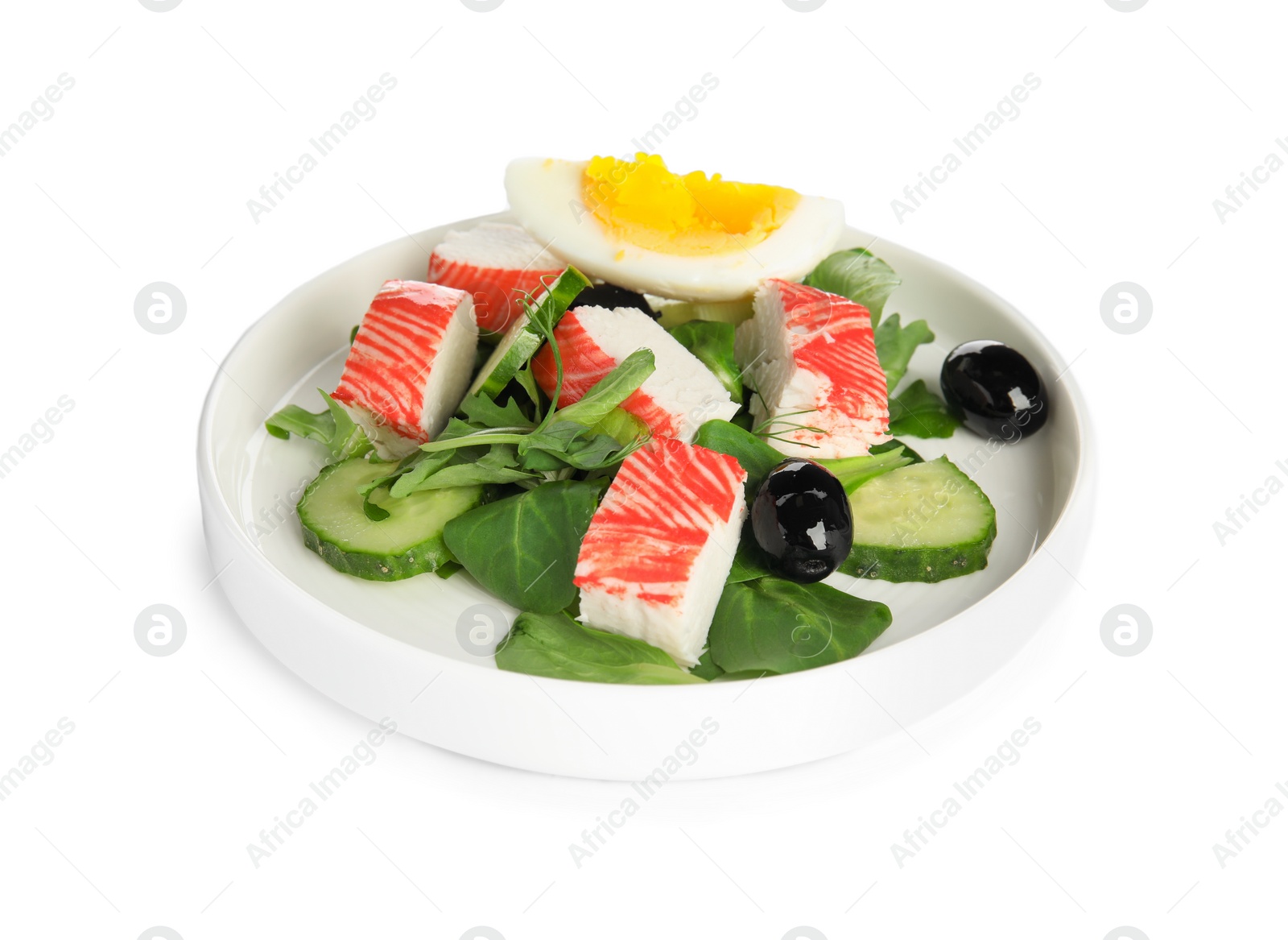 Photo of Delicious crab stick salad isolated on white