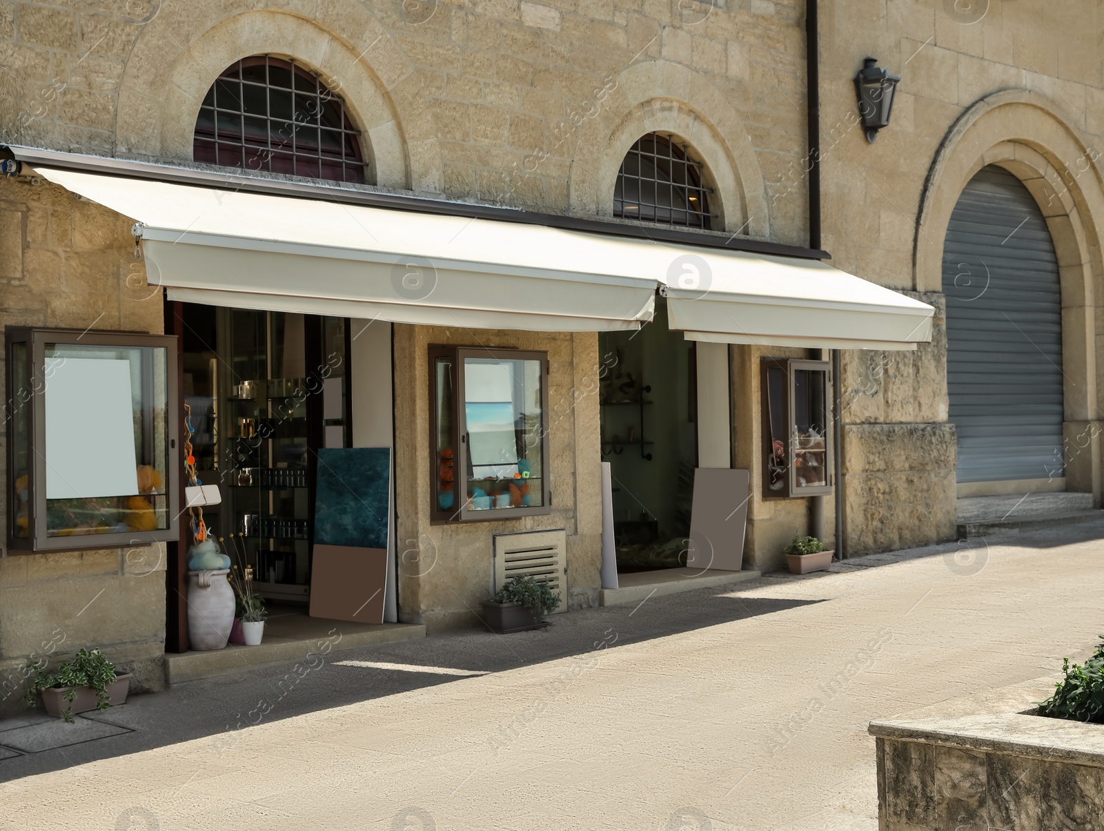 Photo of Beautiful view of city street with stores