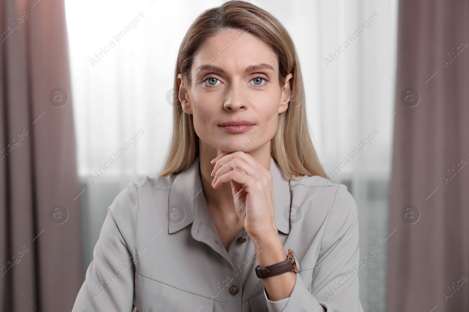 Photo of Woman having video call indoors, view from web camera