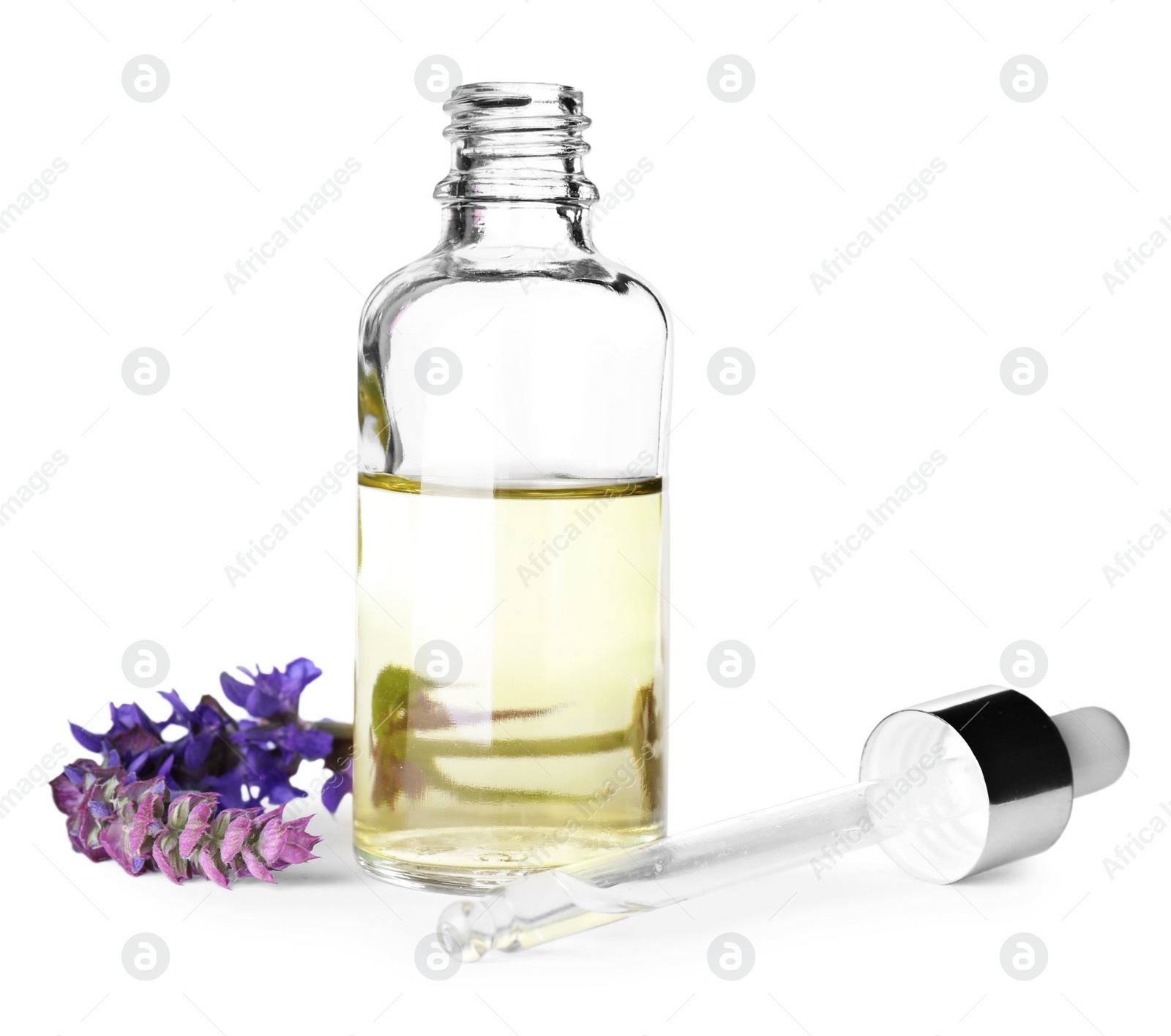 Photo of Bottle of sage essential oil, pipette and flowers isolated on white