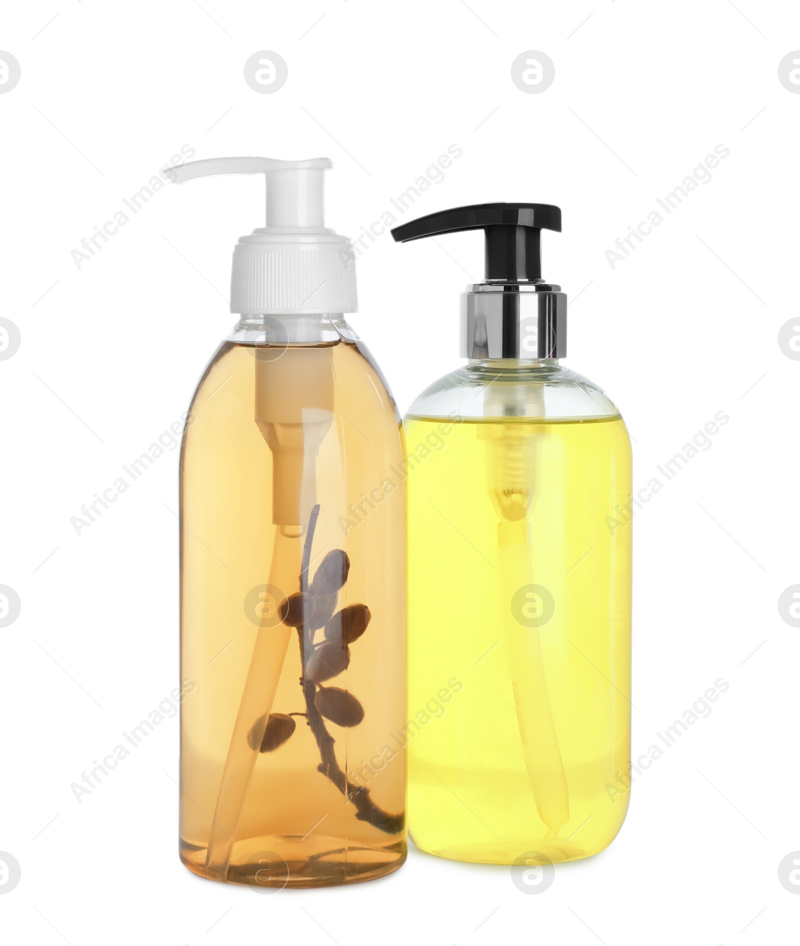 Photo of Dispensers of liquid soap on white background