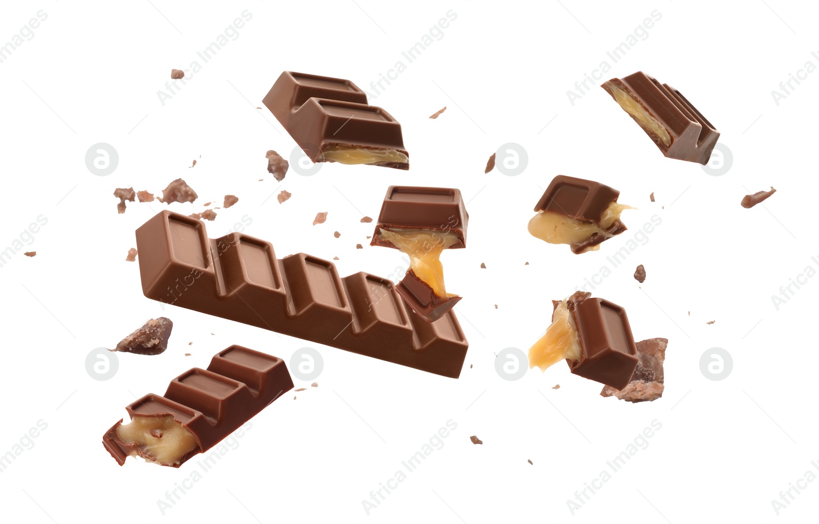 Image of Whole and broken chocolate bars with caramel falling on white background