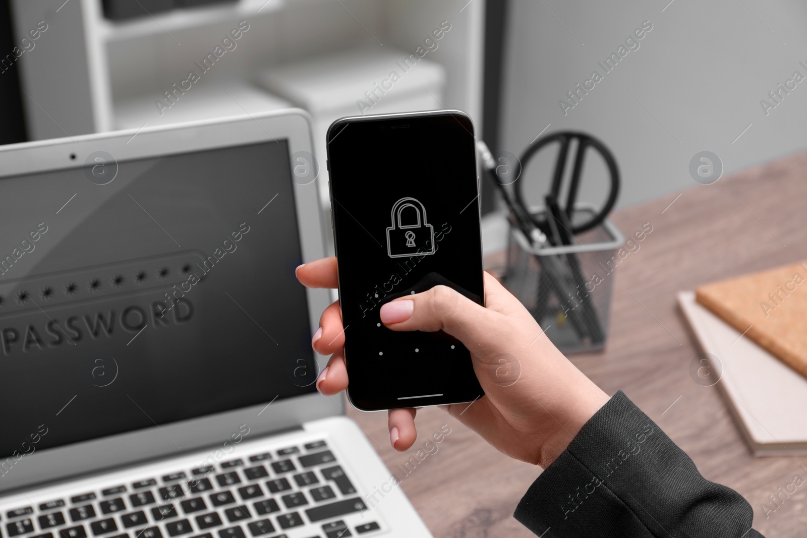 Photo of Woman unlocking smartphone with blocked screen indoors, closeup