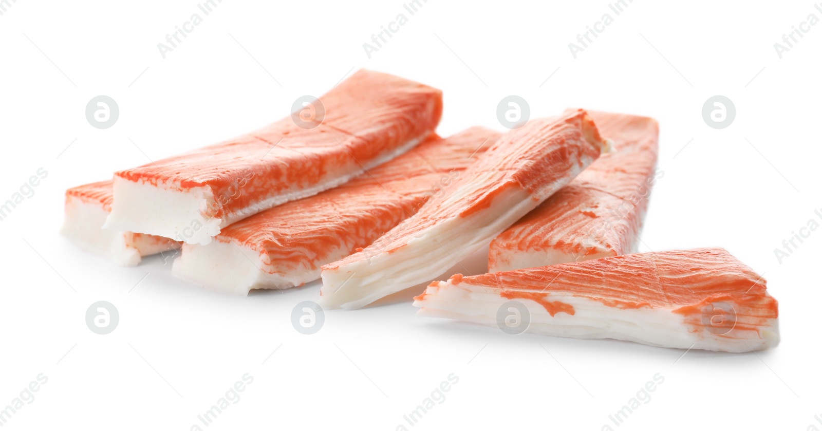 Photo of Delicious fresh crab sticks isolated on white
