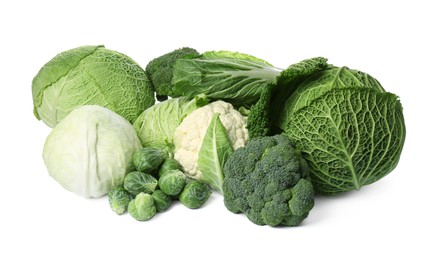 Photo of Many different fresh ripe cabbages on white background