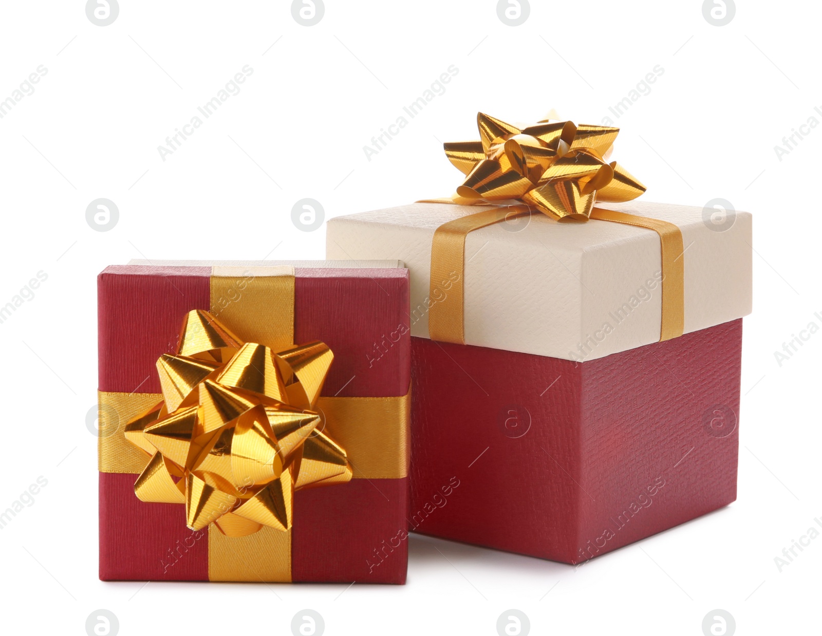 Photo of Beautiful gift boxes with bows on white background