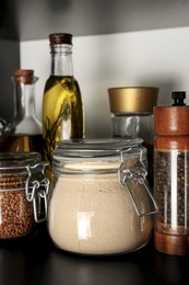 Photo of Glass jar of buckwheat flour on shelf