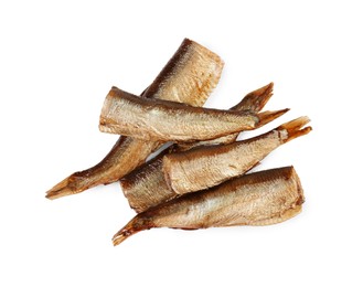 Photo of Tasty canned sprats isolated on white, top view