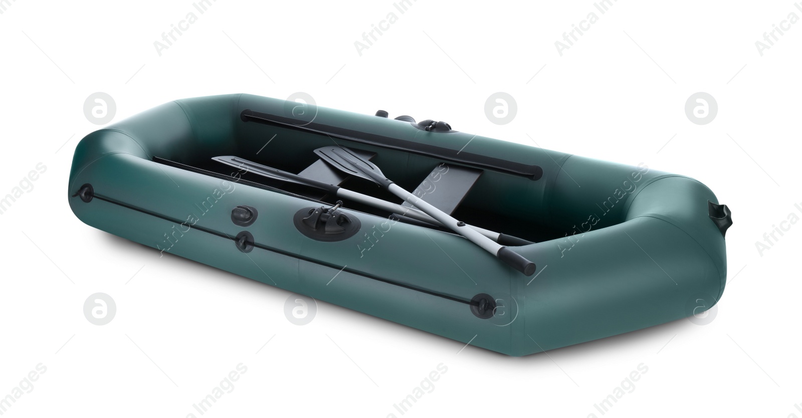 Photo of Inflatable rubber fishing boat with aluminium oars and seats isolated on white