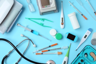 Photo of Flat lay composition with different medical objects on color background