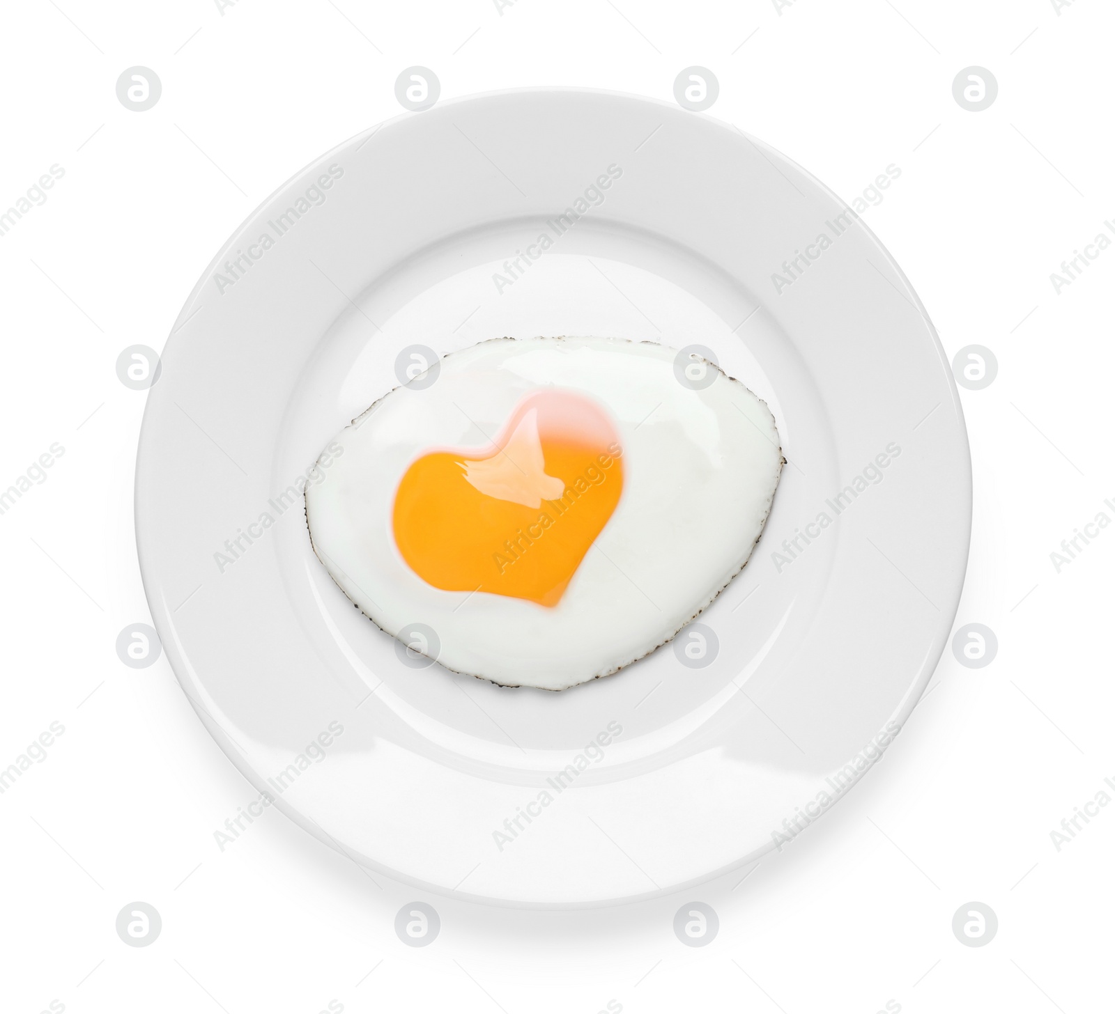 Image of Plate with tasty fried egg with yolk in shape of heart on white background, top view