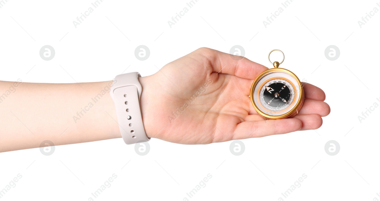 Photo of Woman holding compass on white background, closeup