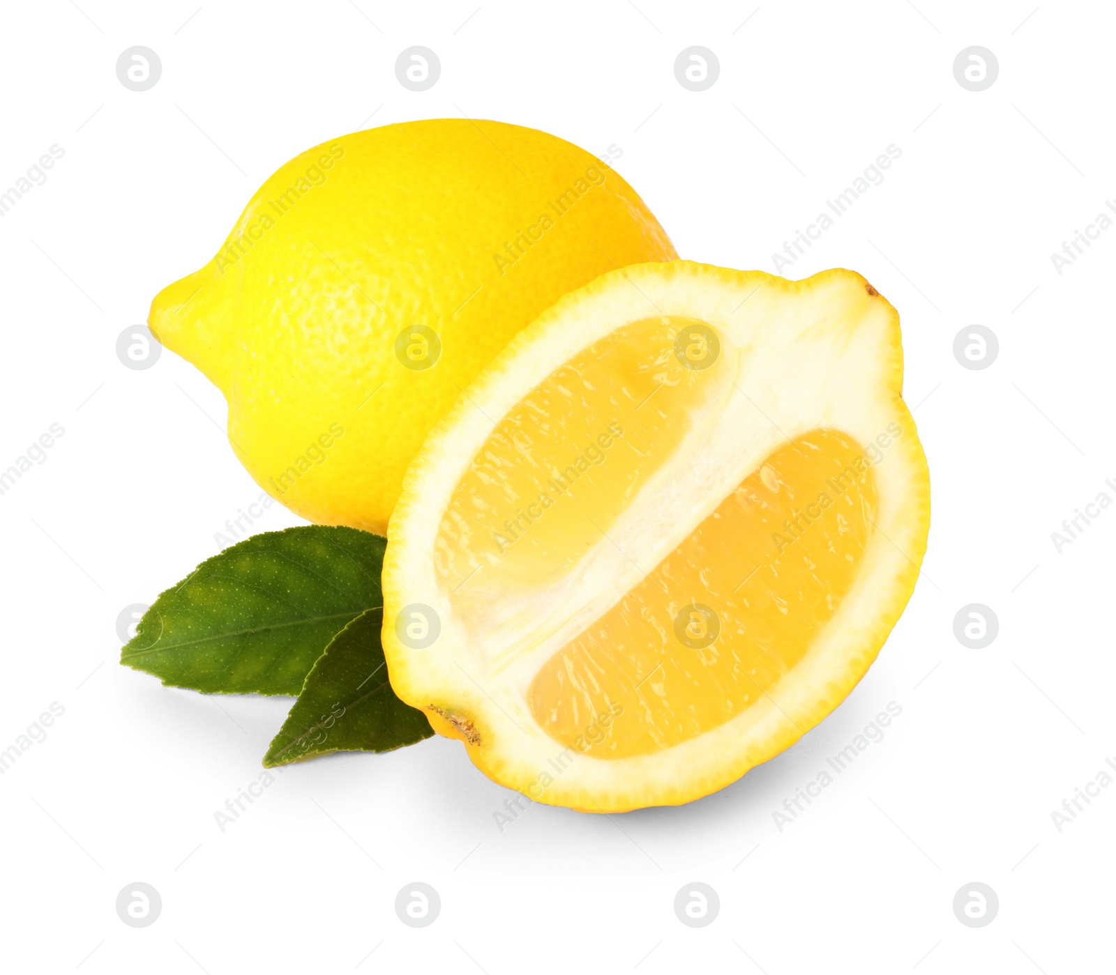 Photo of Cut and whole ripe lemons with green leaves isolated on white