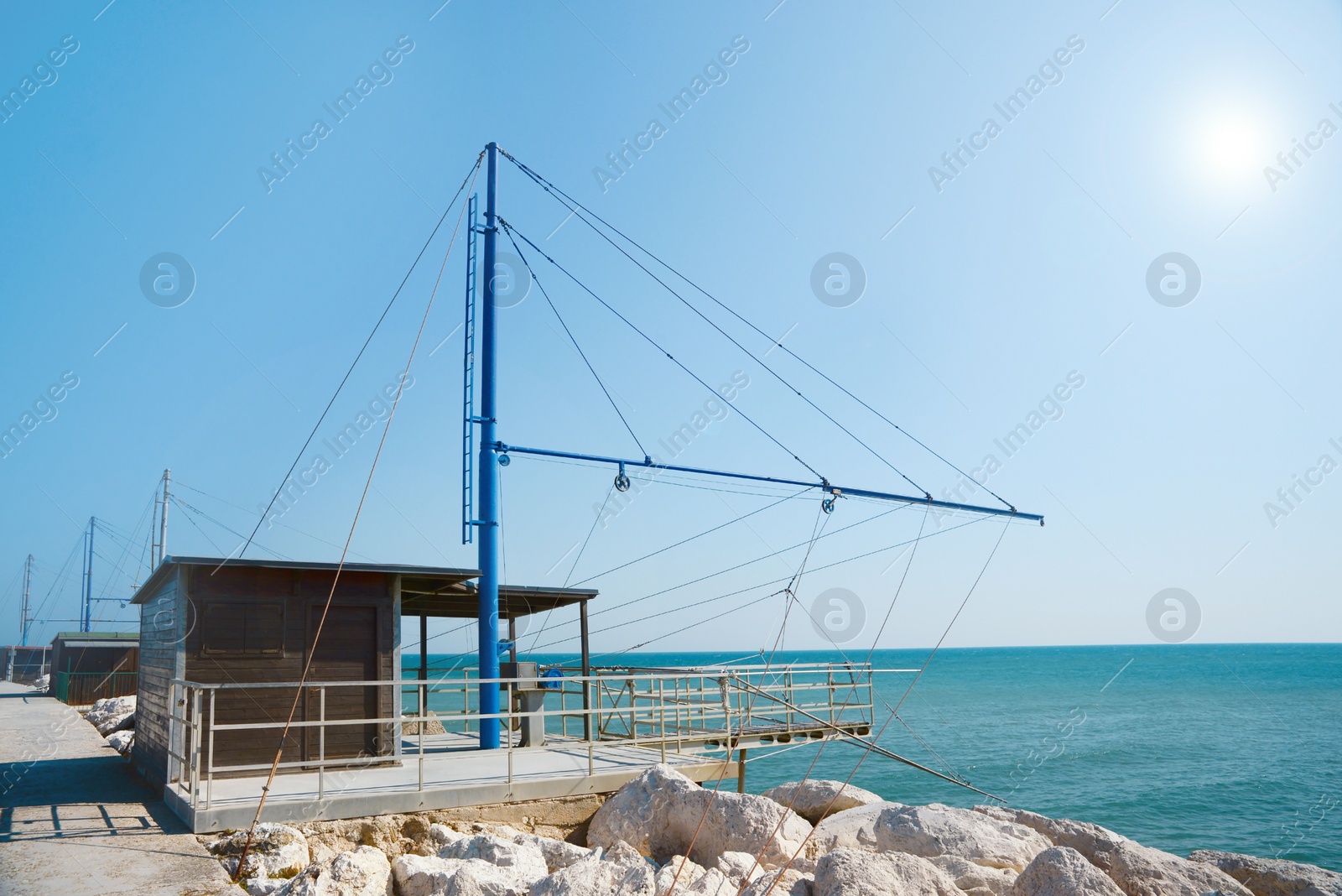 Photo of Shore operated stationary lift net on coast