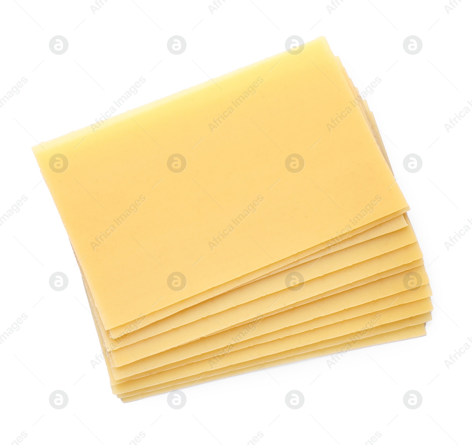 Photo of Stack of uncooked lasagna sheets isolated on white