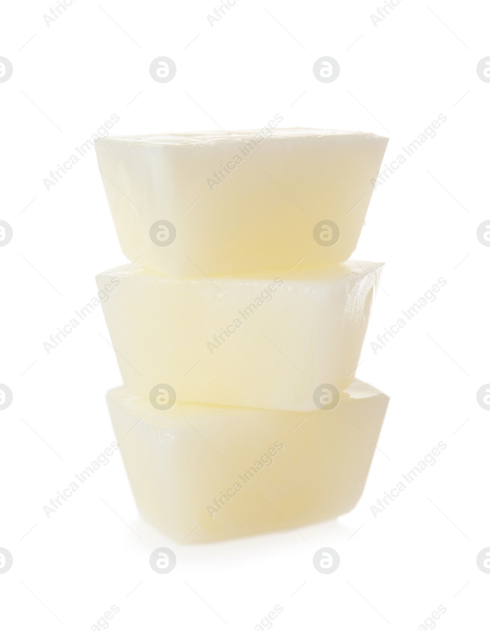 Photo of Tasty milk ice cubes on white background