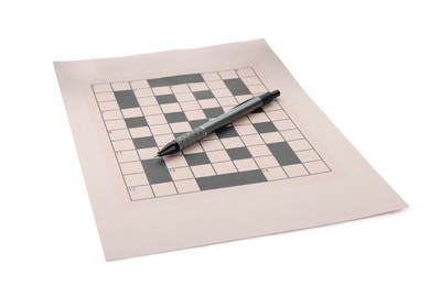 Photo of Blank crossword and pen on white background