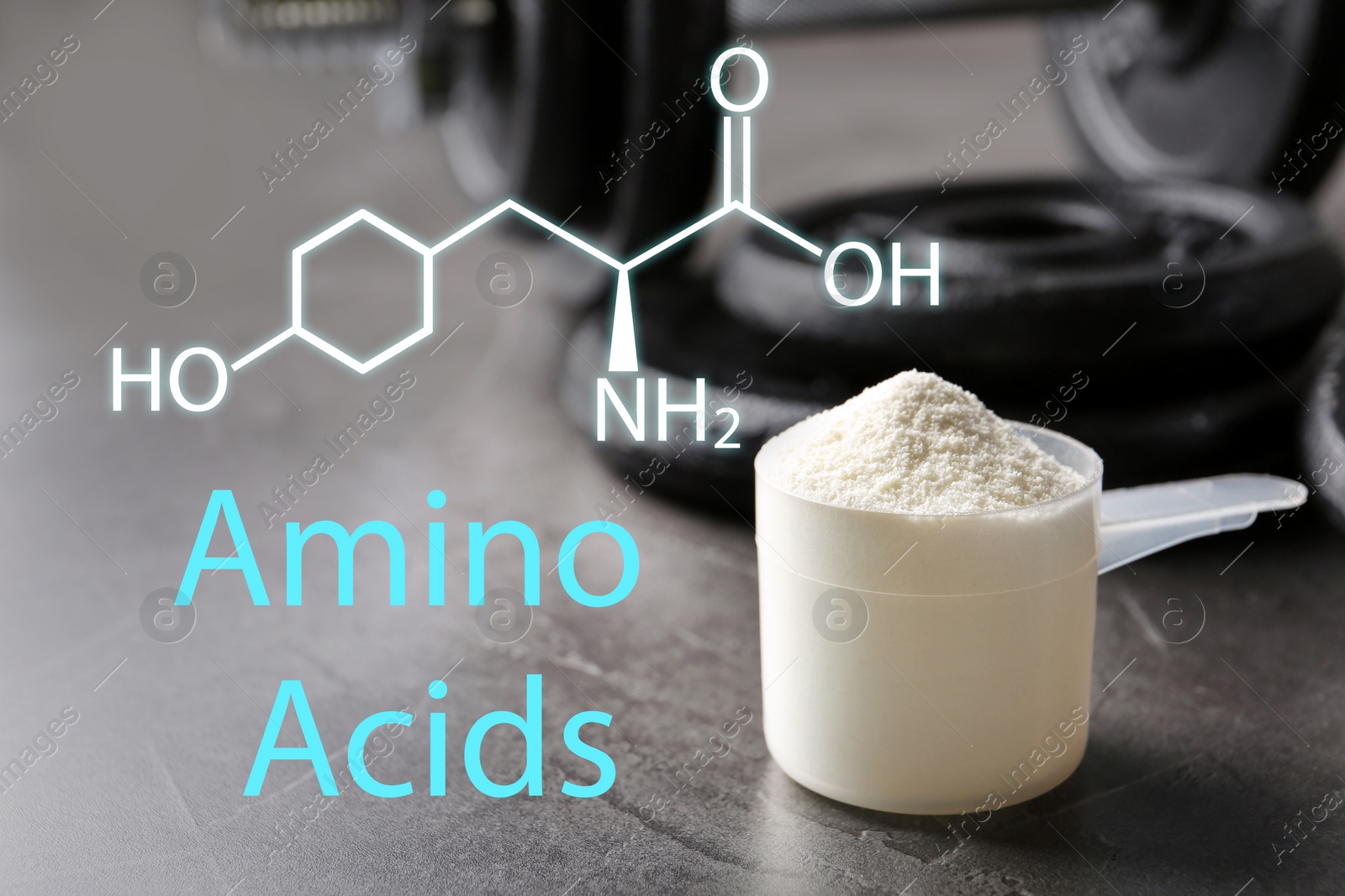 Image of Measuring scoop of amino acids powder on grey table 