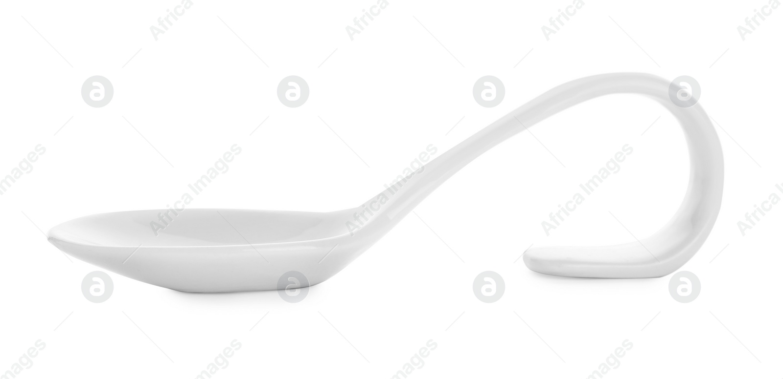 Photo of Clean empty ceramic appetizer spoon on white background